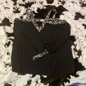 a shoulder less long sleeve shirt